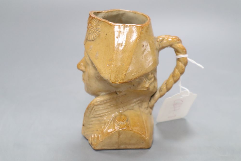 A Doulton and Watts Lambeth stoneware Nelson jug, height 13cm